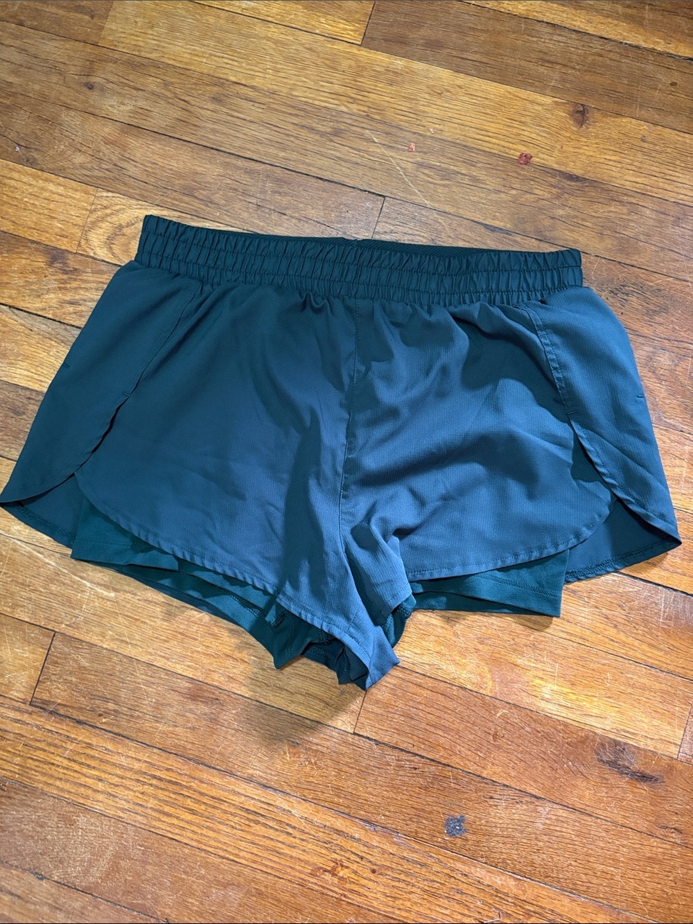 girlfriend collective deep green layered athletic shorts
